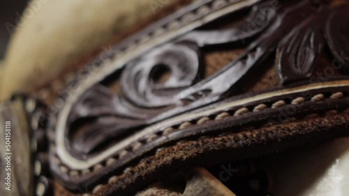 CLOTHING CHARROS CLOSE UP  LEATHER TEXTURE DETAILS photo