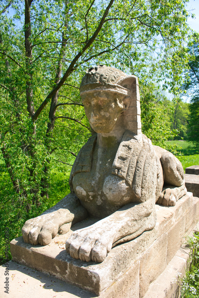 A bridge with sphinx statue. Veltrusy chateau. Czech Republic. A bridge with sphinx statue. Veltrusy chateau. Czech Republic.