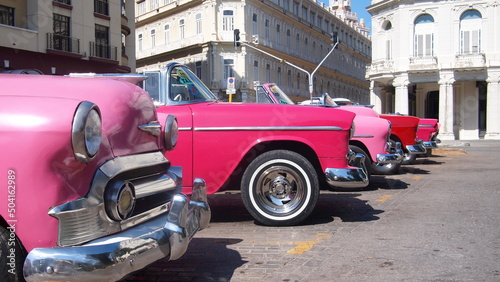 Photography Pink retro cabriolets in the parking, Cuba, Havana