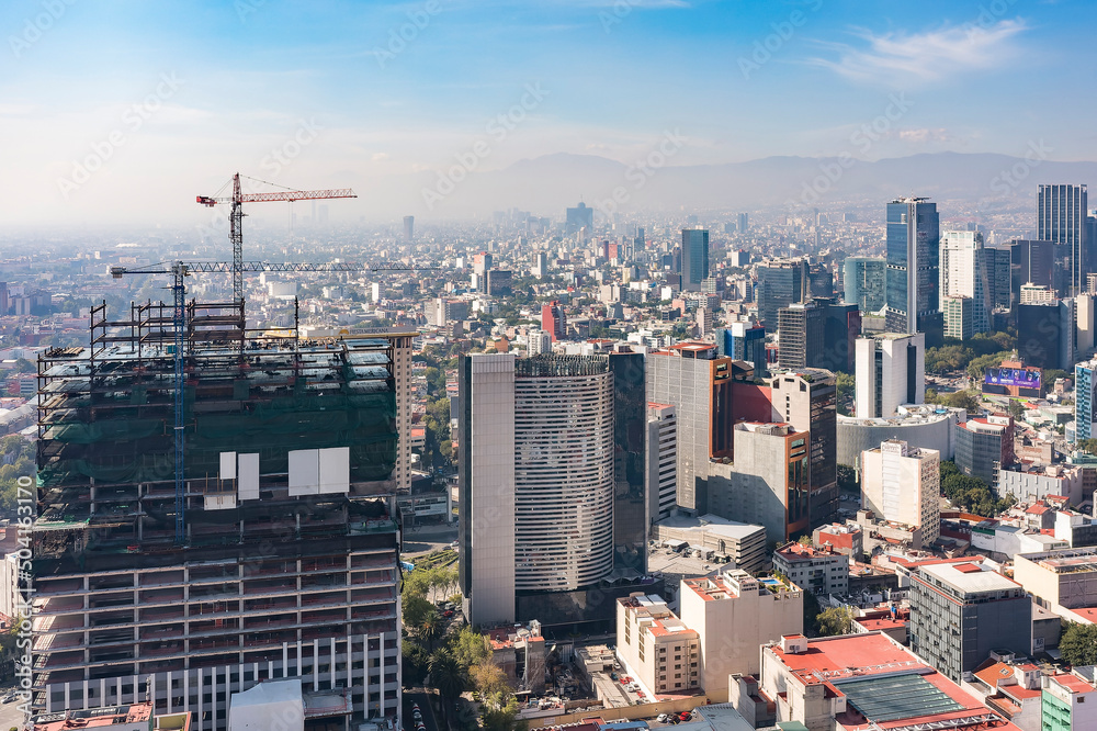 Fototapeta premium aerial view of building under construction in Mexico City, Mexico, sunny day