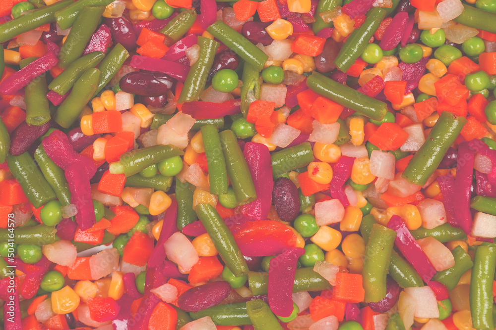 Sliced vegetables, corn, beans, peas, carrots, sweet peppers background. Sliced vegetables, corn, beans, peas, carrots, sweet peppers background.