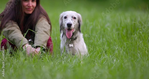 Young woman with English Setter dog
