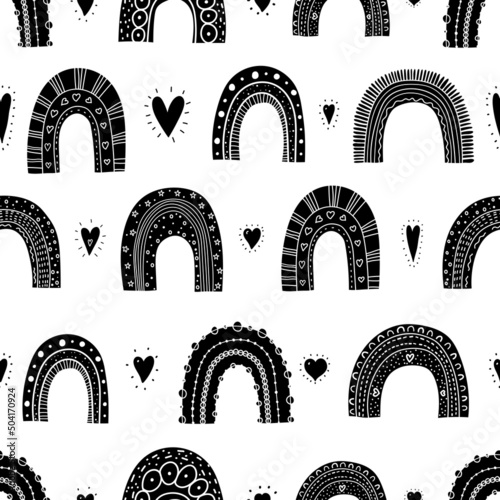 Black seamless pattern with magic rainbows and hearts. Can be used in textile industry, paper, background, scrapbooking...