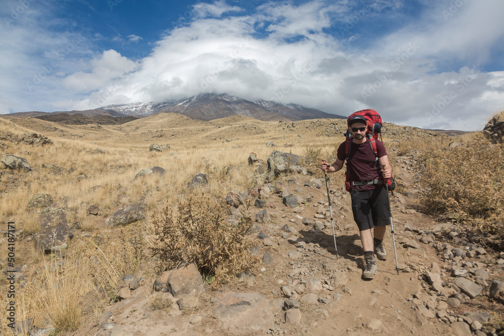 Tourists hike to the snow-capped and dormant compound volcano Mount Ararat (Agri Dagi), Eastern Anatolia Region, Turkey