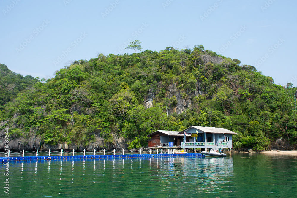 Security extraction point Ko Khao Yai and plastic pontoons pier in sea ocean of Mu Ko Petra National Park for check and service thai travelers people at Pak Bara on April 12, 2022 in Satun, Thailand