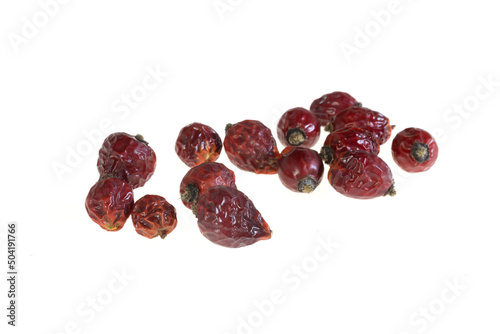 dried rosehips on a white isolated background