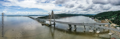 Temburong Bridge is a 30-kilometre (19-mile) bridge currently under construction in Brunei. It will connect Mengkubau and Sungai Besar in Brunei-Muara District and Labu Estate in Temburong District. photo