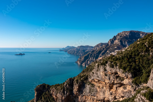 Panoramic view from hiking trail Path of Gods between coastal towns Positano and Praiano. Trekking in Lattari Mountains, Apennines, Amalfi Coast, Campania, Italy, Europe. Coastline Mediterranean Sea