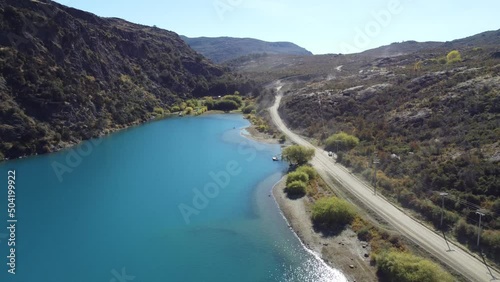 Top aerial drone panoramic view Beautiful mountains landscape and river along gravel road Carretera Austral in southern Patagonia, Chile