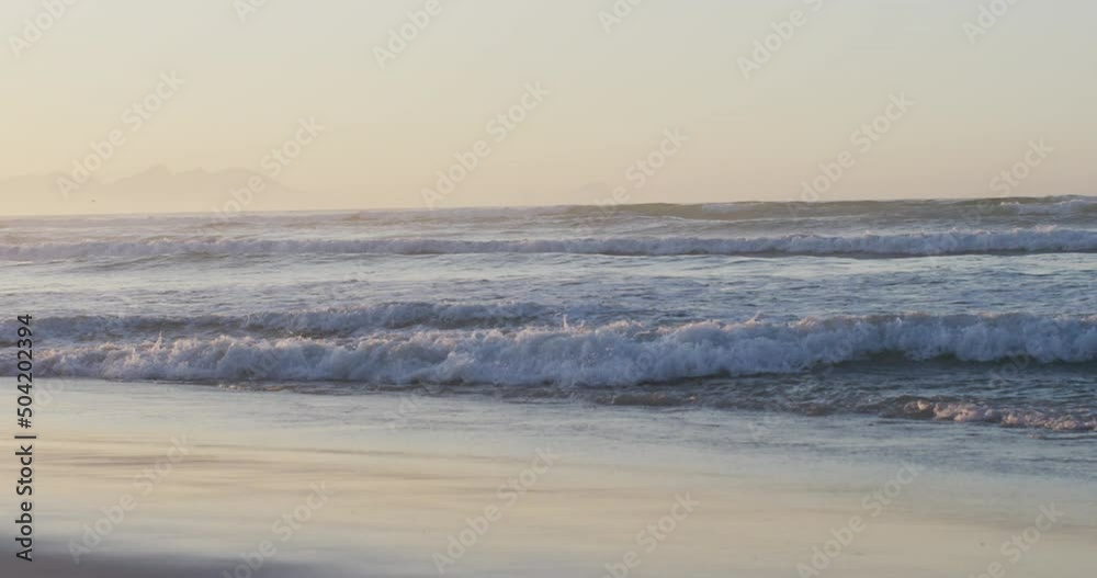 Sea with waves and blue sky on sunny beach Sea with waves and blue sky on sunny beach
