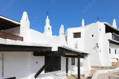 Binibeca, bonito pueblo pesquero de casas blancas en Menorca. photo