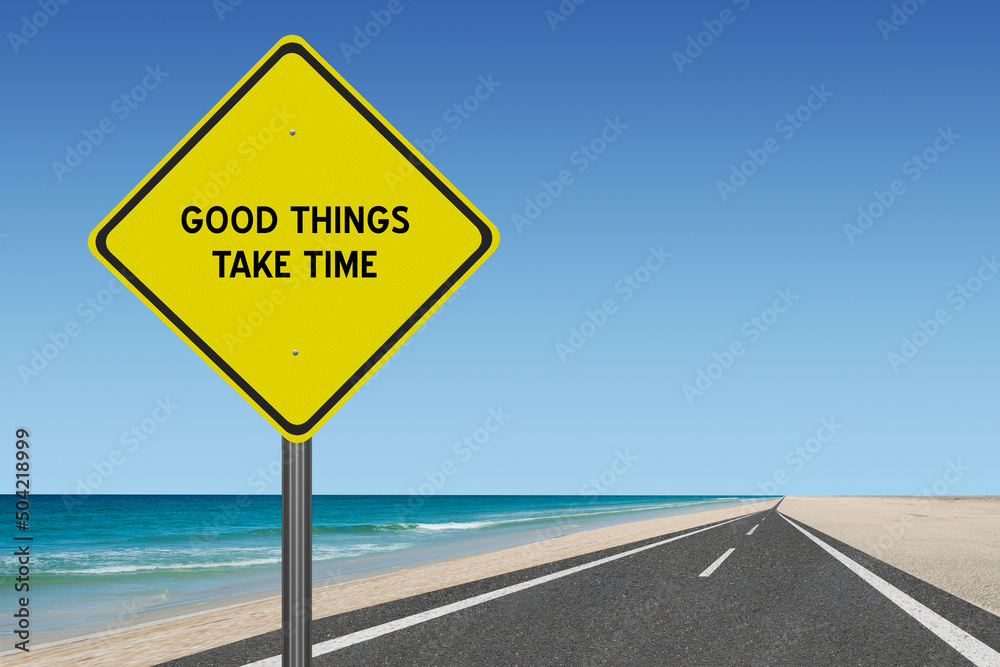 Good Things Take Time motivational quote on sign.