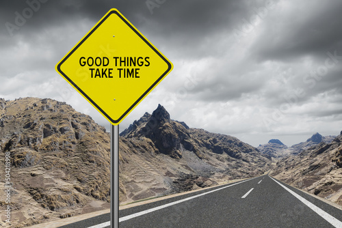 Good Things Take Time motivational quote on sign.