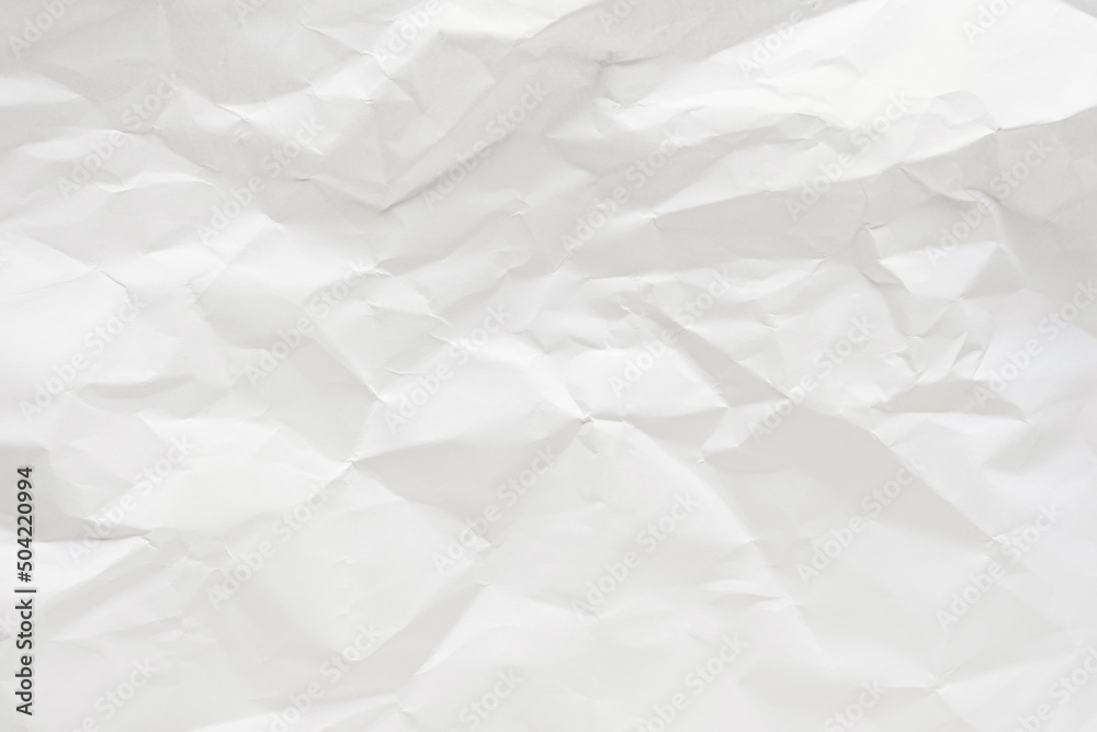 Obraz premium White crumpled paper texture background, clean white wrinkled paper, top view.