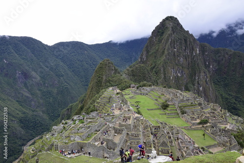 Ruins of the ancient Inca city machu picchu in fog, Peru