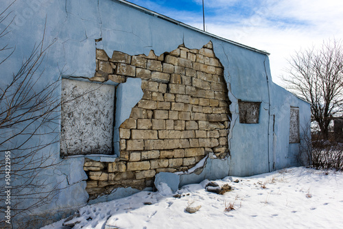 A limestone wall is visible through the cracked side of the former post office at Nicodemus, Kansas, the first all-Black settlement west of the Mississippi photo