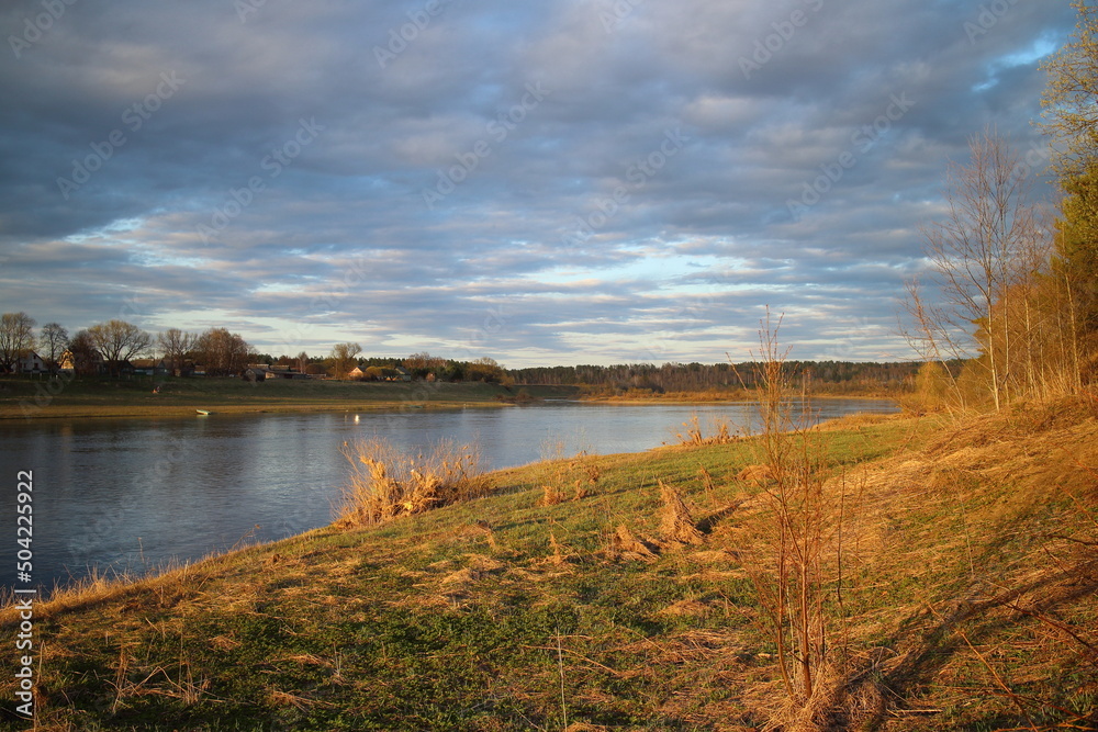 Evening on the river in the countryside in spring