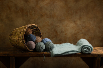 Rustic basket with blue wool balls