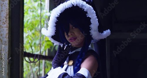 Epic close up of an anime cosplayer wearing Wendy Belserion costume photo