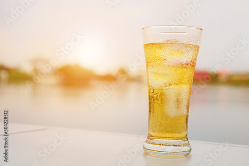 Beer with ice in a glass.