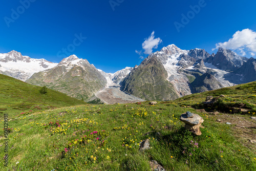 Summer trekking day in the mountains of Val Veny, Courmayeur photo