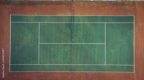 Aerial view of a tennis court layout with copy space