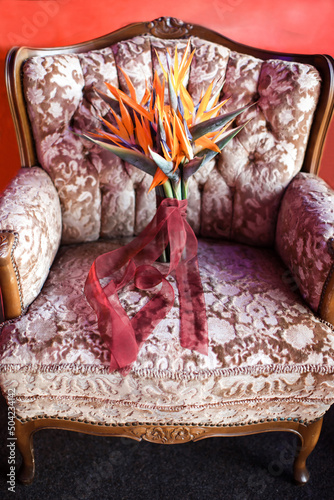 Beautiful wedding bouquet on a pink chair
