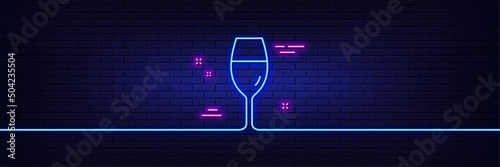 Neon light glow effect. Wine glass line icon. Burgundy glass sign. 3d line neon glow icon. Brick wall banner. Wineglass outline. Vector