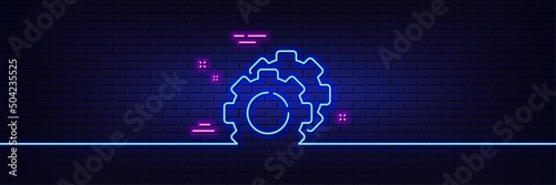 Neon light glow effect. Settings gears line icon. Cogwheel sign. Working process symbol. 3d line neon glow icon. Brick wall banner. Settings gears outline. Vector