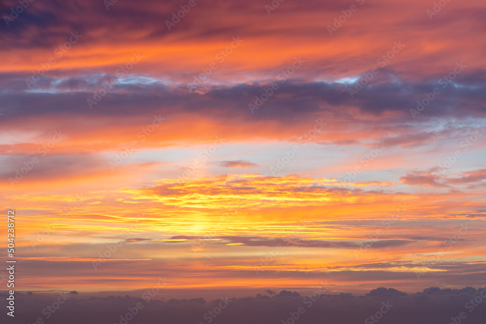 A delightful sunrise paints the sky in fiery colors A delightful sunrise paints the sky in fiery colors