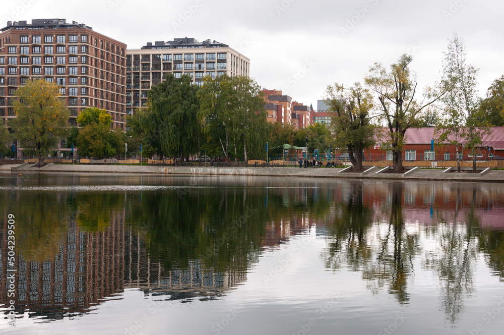 Ufa, Russia,st. Lenina, Park of Culture and Leisure Modern buildings near the large lake. Green trees around