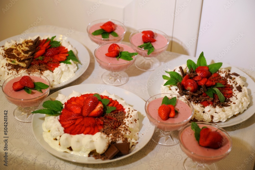 Strawberry cake with cream and mint with grated chocolate airy and incredibly tasty from natural products. High quality photo Strawberry cake with cream and mint with grated chocolate airy and incredibly tasty from natural products. High quality photo