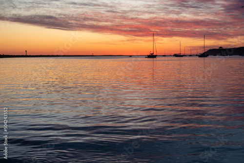 Sunset at half moon bay pillar point harbor beach