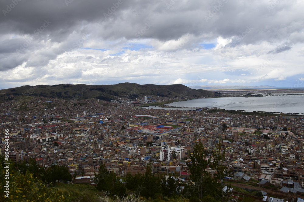 View from a high point of Lake Titicaca and the city of Puno, Peru