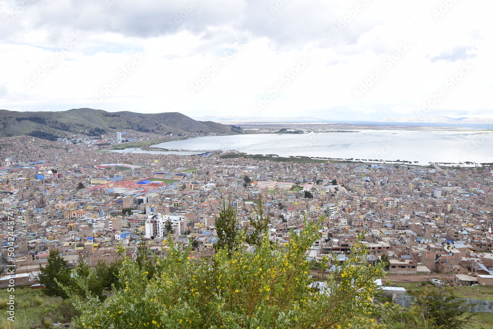 View from a high point of Lake Titicaca and the city of Puno, Peru