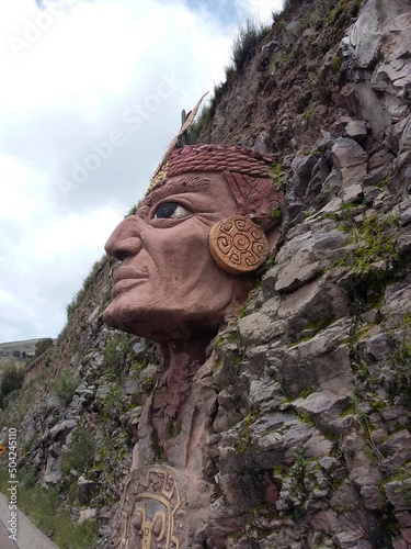 Sculpture of an Indian in a rock in Chucuito, Puno Peru photo
