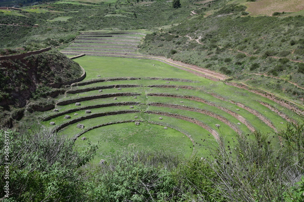 Inca terraces of Moray. Each level has its own microclimate. Moray is an archaeological site near the Sacred Valley Inca terraces of Moray. Each level has its own microclimate. Moray is an archaeological site near the Sacred Valley
