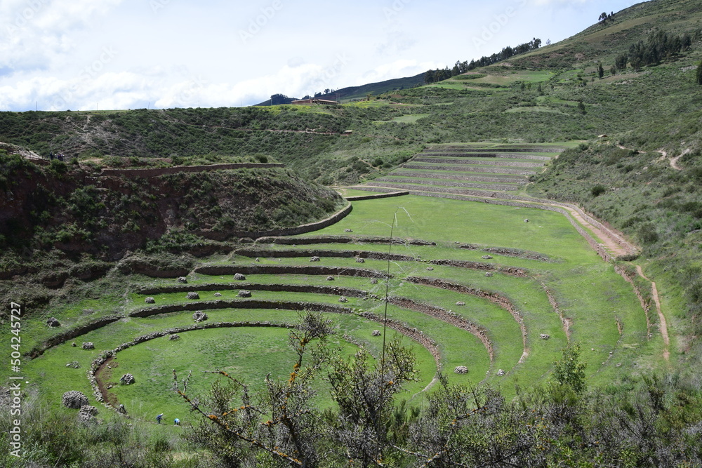 Inca terraces of Moray. Each level has its own microclimate. Moray is an archaeological site near the Sacred Valley Inca terraces of Moray. Each level has its own microclimate. Moray is an archaeological site near the Sacred Valley