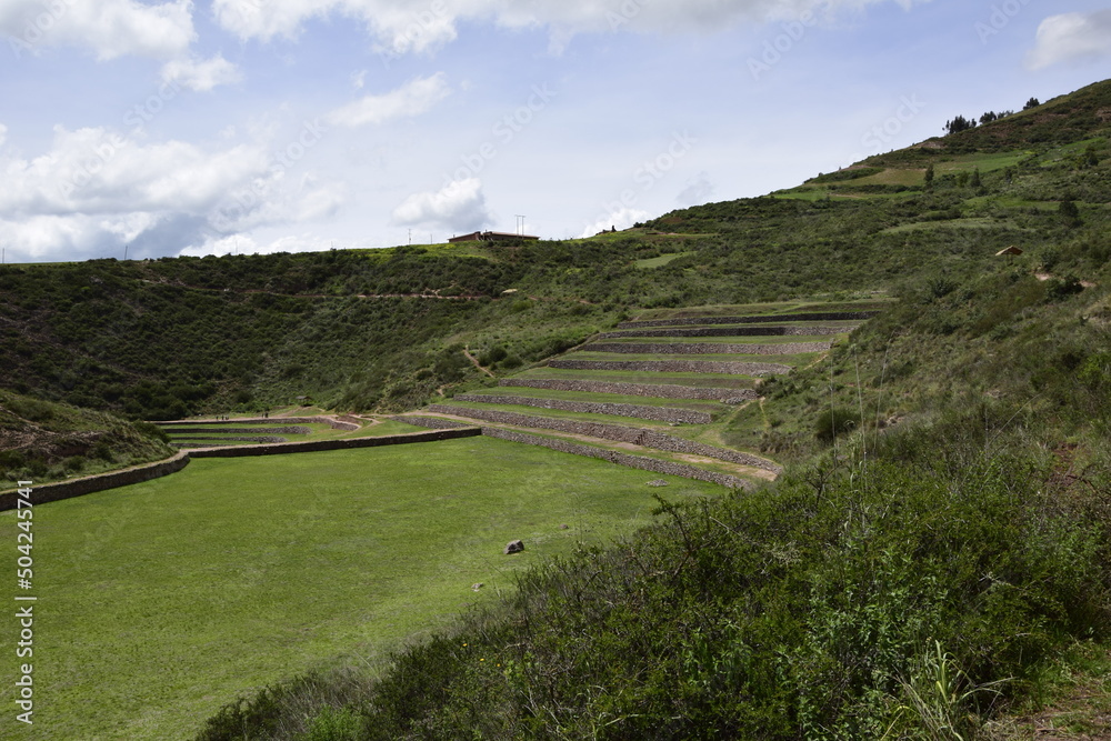 Inca terraces of Moray. Each level has its own microclimate. Moray is an archaeological site near the Sacred Valley Inca terraces of Moray. Each level has its own microclimate. Moray is an archaeological site near the Sacred Valley
