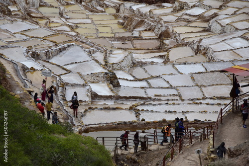 Landscape of the salt terraces of Maras (Salineras de Maras) in the Andes mountain range in the region of Cusco, Peru