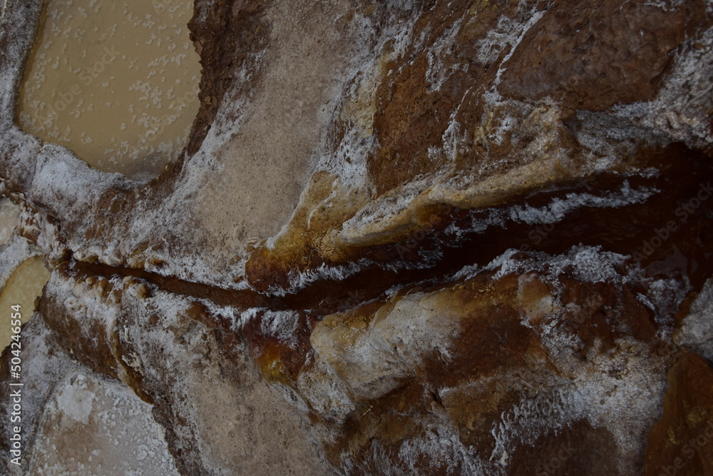 Fototapeta premium Terraced salt pans also known as (Salineras de Maras), among the most scenic travel destination in Cusco Region, Peru