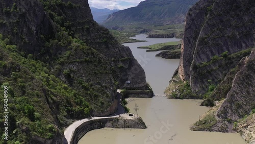 panoramic view of the Caucasus mountains gorges ancient fortresses and curved mountain roads on a spring day
