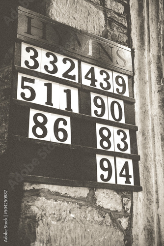 Hymn Board At Cockington Parish Church, Devon photo