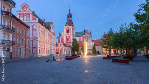 Old houses on Collegiate Square at dawn. Poznan. Poland.