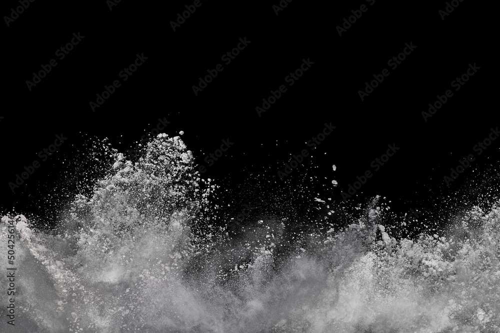 White powder explosion on black background. Colored cloud. Colorful dust explode. Paint Holi. White powder explosion on black background. Colored cloud. Colorful dust explode. Paint Holi.