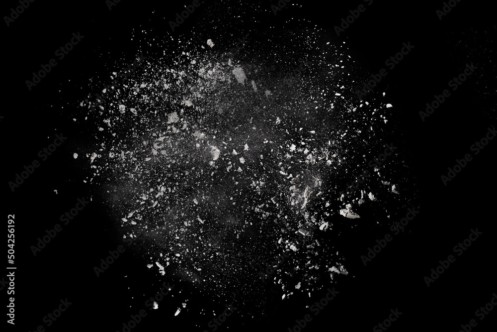 White powder explosion on black background. Colored cloud. Colorful dust explode. Paint Holi.