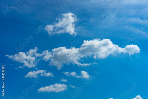 Blue sky background with white clouds. Beautiful summer blue sky © Serhii
