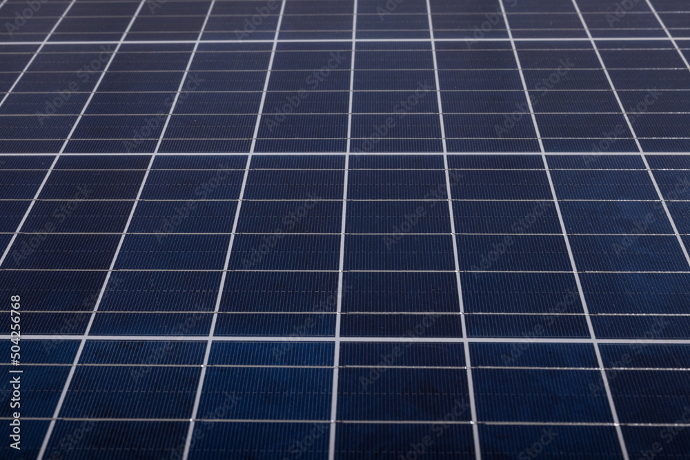 Full frame shot of blue solar panel with white grid patterns, copy space Full frame shot of blue solar panel with white grid patterns, copy space