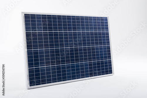 Blue solar panel with grid patterns isolated against white background, copy space