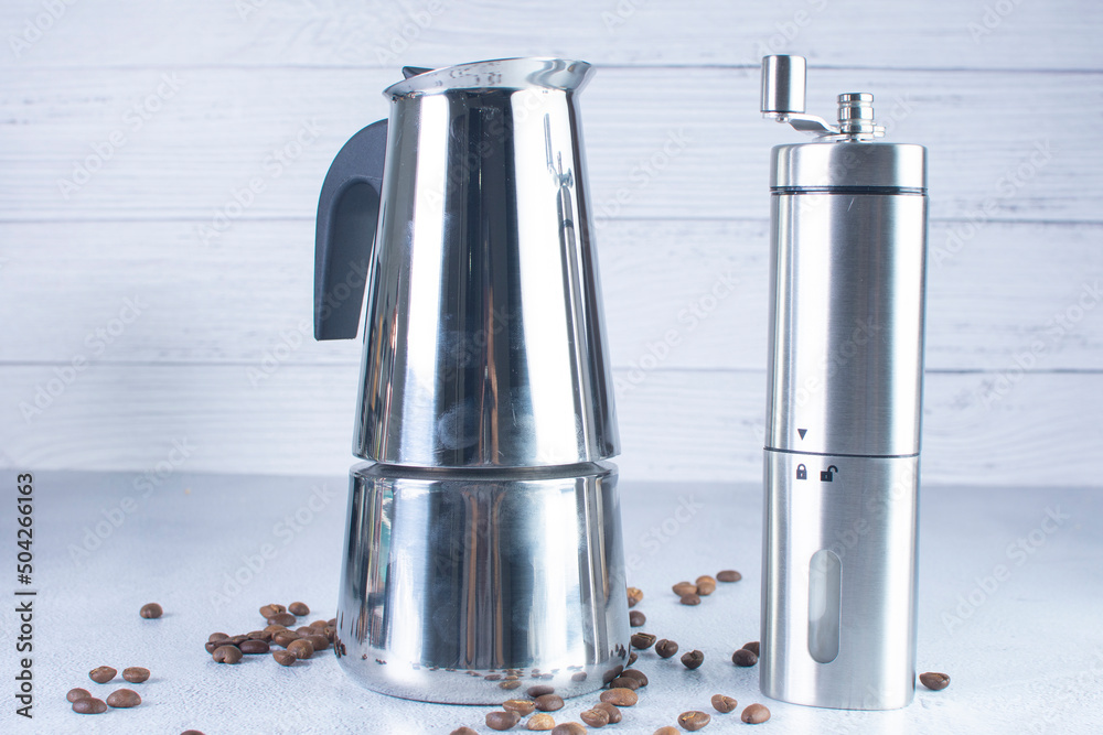 coffee maker and coffee grinder on gray background coffee maker and coffee grinder on gray background